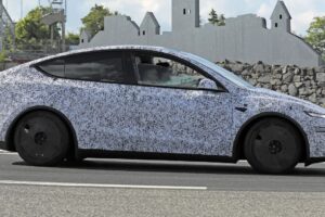 Tesla Model Y Performance side profile cornering u0dg67 6