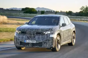 BMW Tesla new iX3 1 2